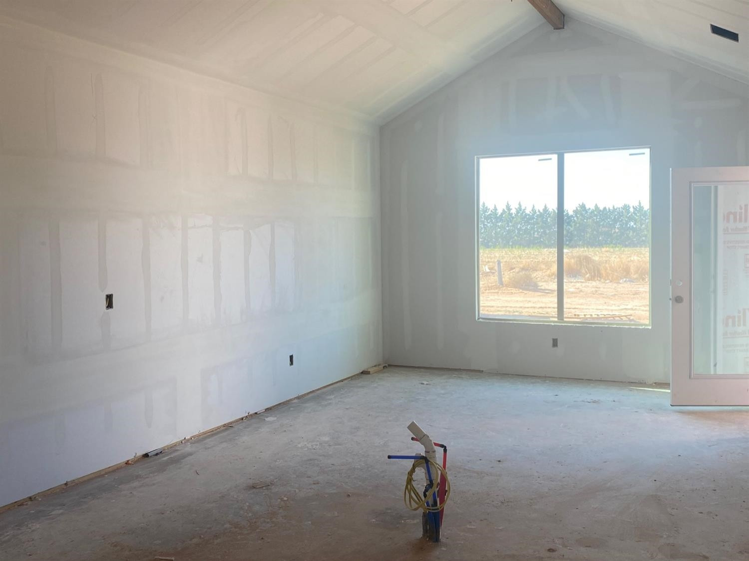 2709 138th Street Lubbock, TX 79423 - Photo 4 of 10 a view of an empty room with a window