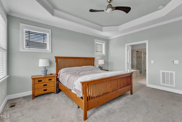 an aerial view of residential house with outdoor space and swimming pool