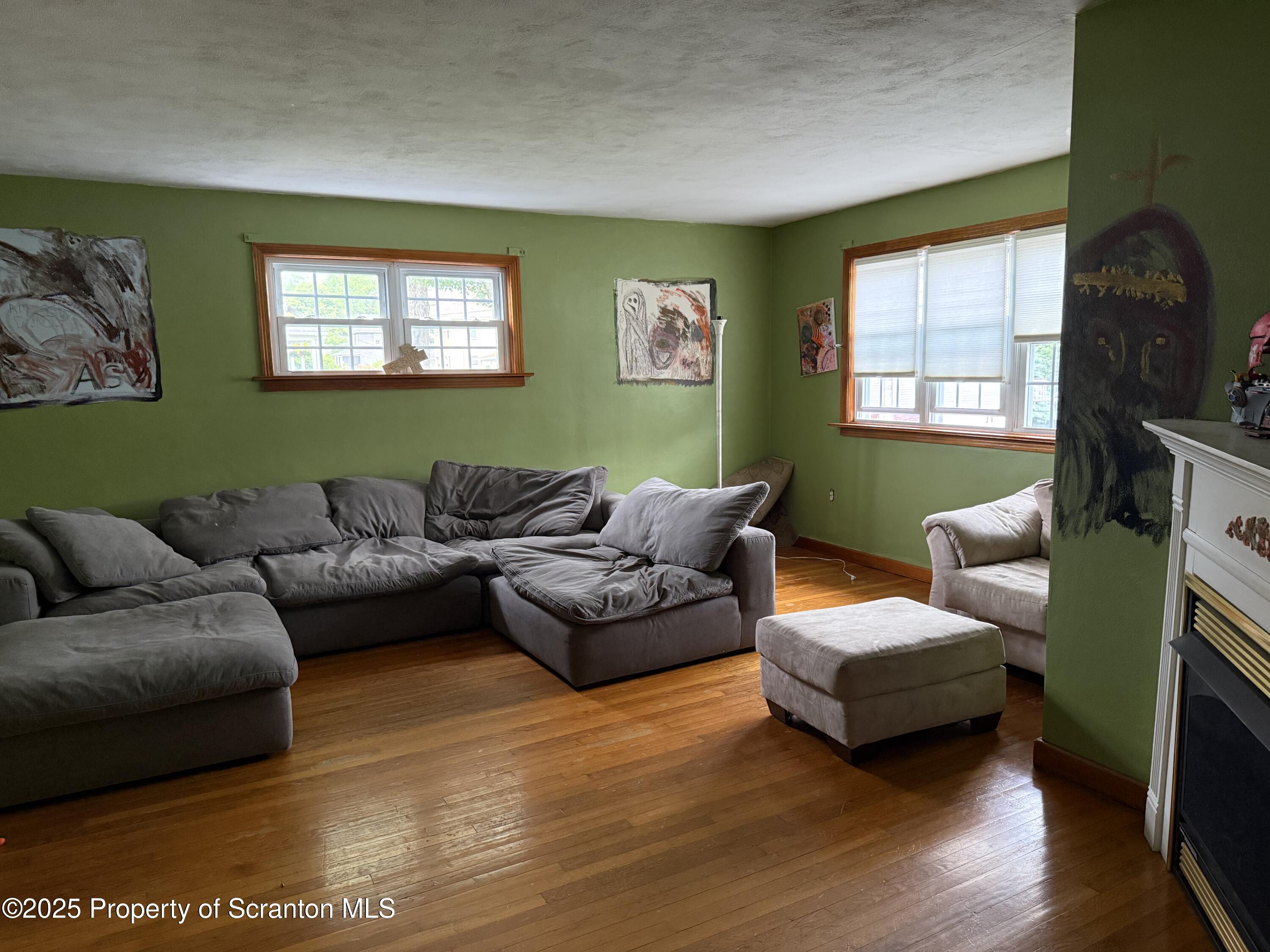 95 Farview Street Carbondale, PA 18407 - Photo 5 of 12 a living room with furniture and a large window