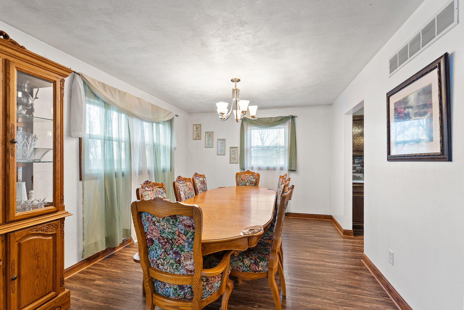 110 Andrea Court Cleveland, IL 61241 - Photo 12 of 23 a view of a dining room with furniture window and wooden floor