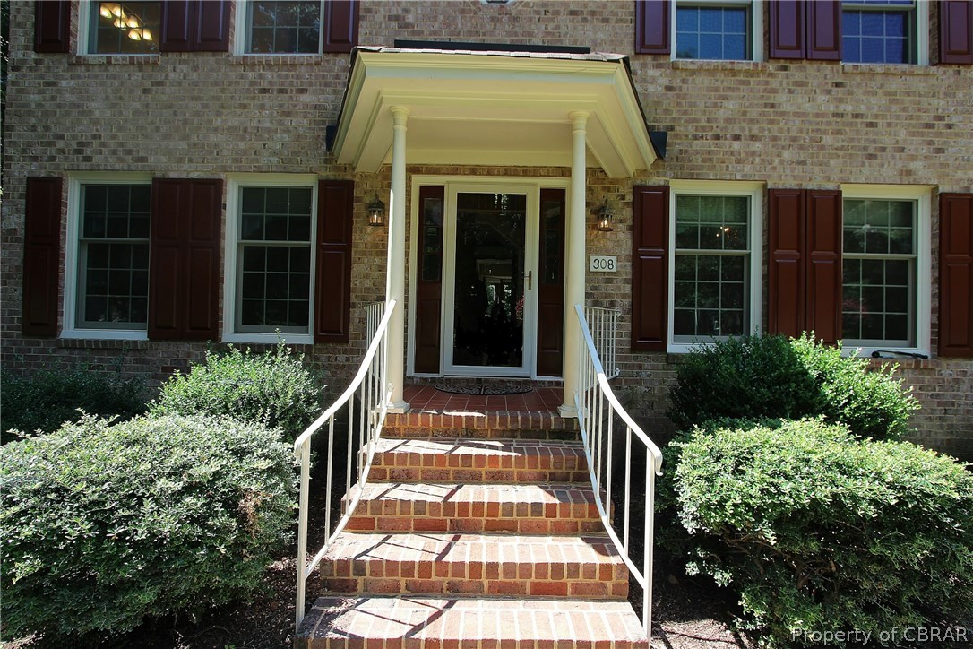 308 Tides Run Yorktown, VA 23692 - Photo 2 of 34 a view of a house with more windows and plants