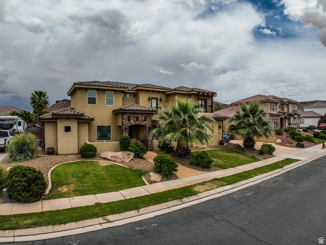3683 South 2640 West St. George, UT 84790 - Photo 1 of 41 Stucco exterior with stone accents and a terracotta tile roof