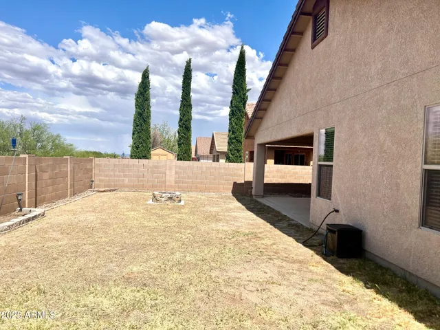 a view of swimming pool with outdoor seating