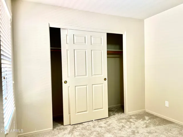 a view of a livingroom with wooden floor