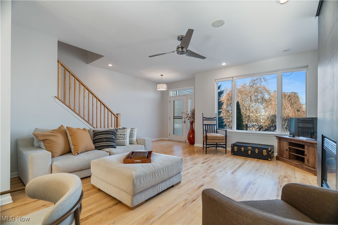 711 University Road Cleveland, OH 44113 - Photo 9 of 36 Living room with ceiling fan and light wood-type flooring
