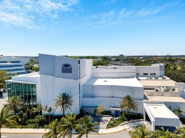 a view of a yard with a swimming pool