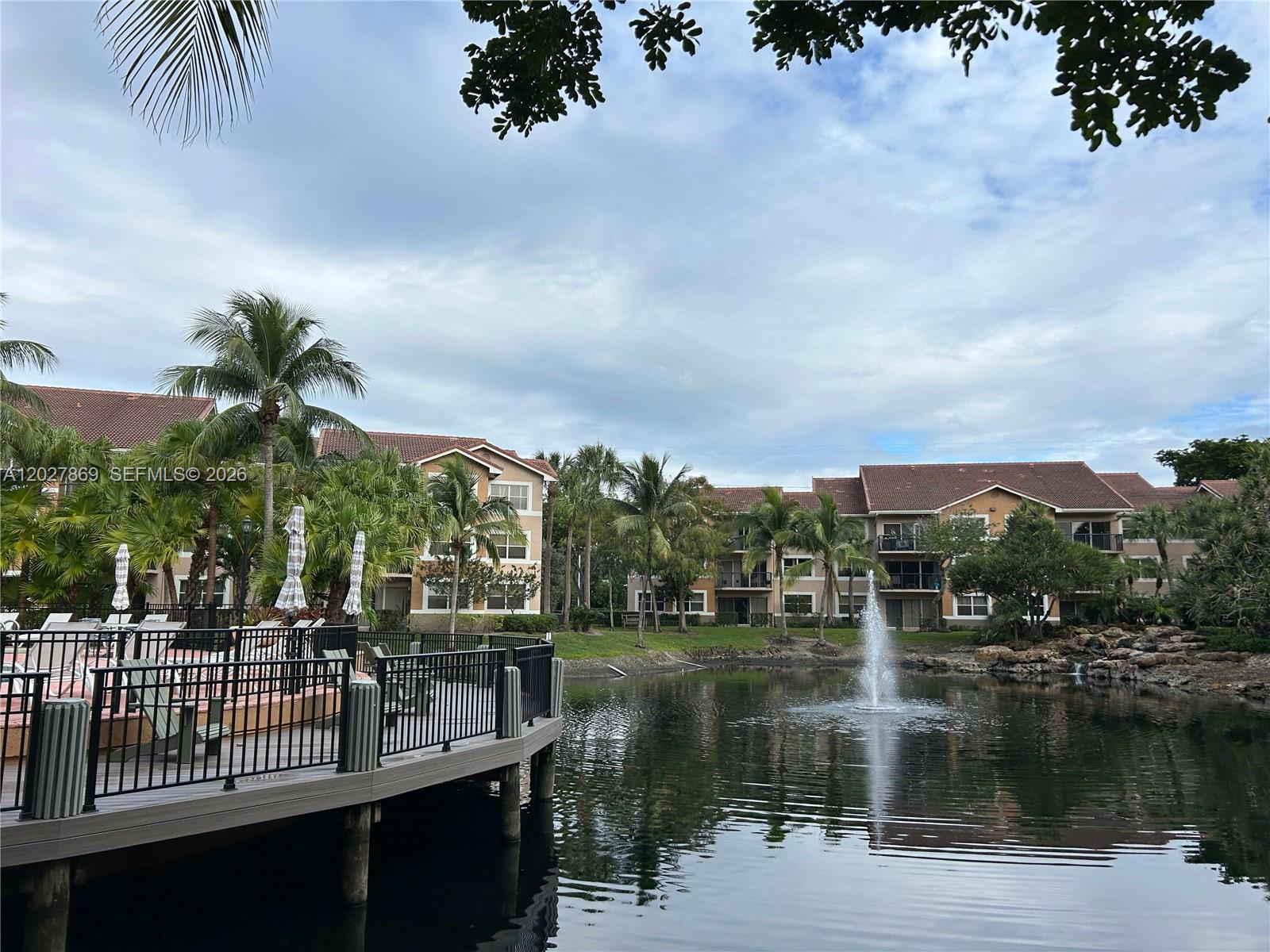 8761 Wiles Road, Unit 206 Coral Springs, FL 33067 - Photo 16 of 26 a view of lake