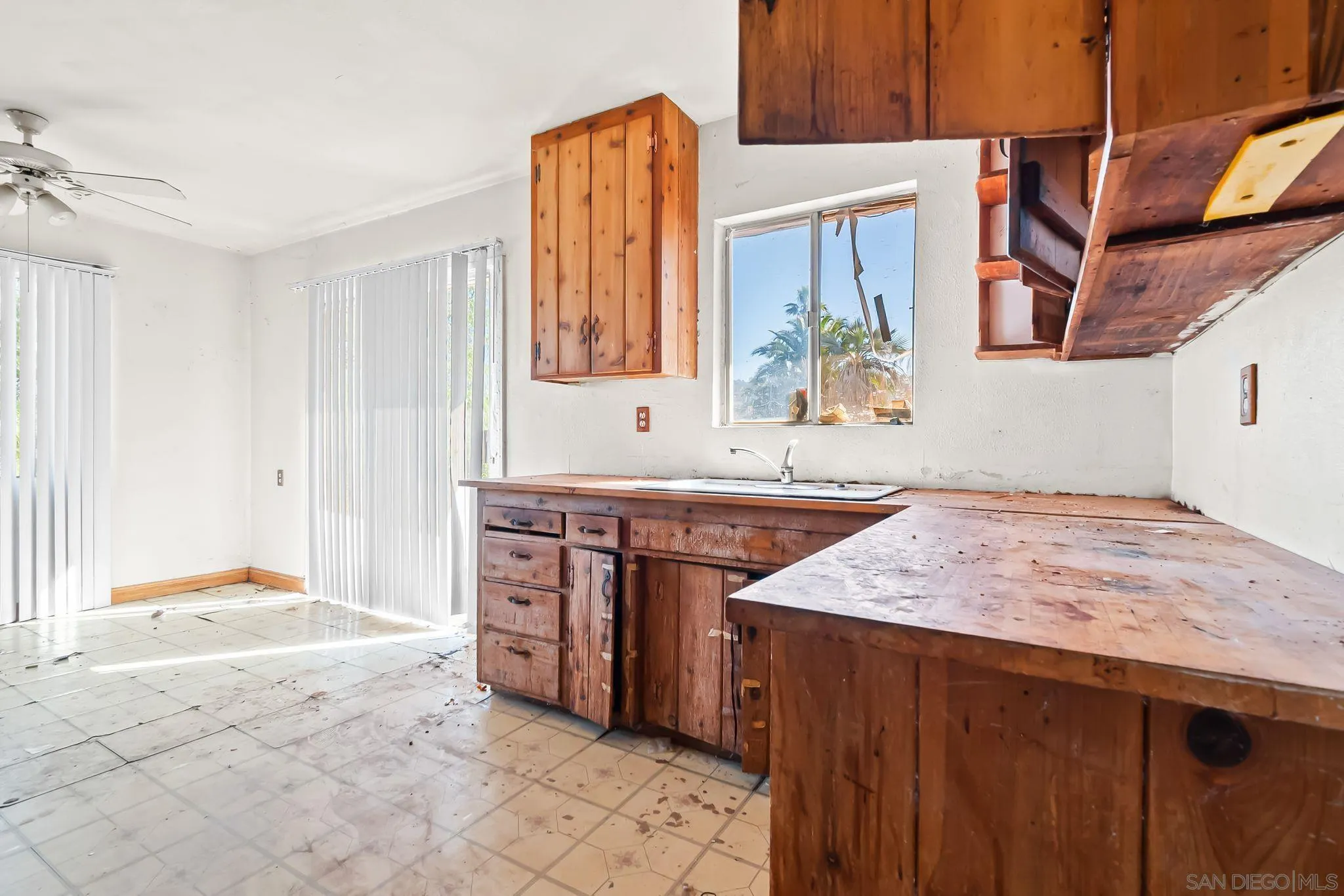 6133 Rainbow Heights Road Fallbrook, CA 92028 - Photo 24 of 55 a bathroom with a granite countertop sink and a mirror