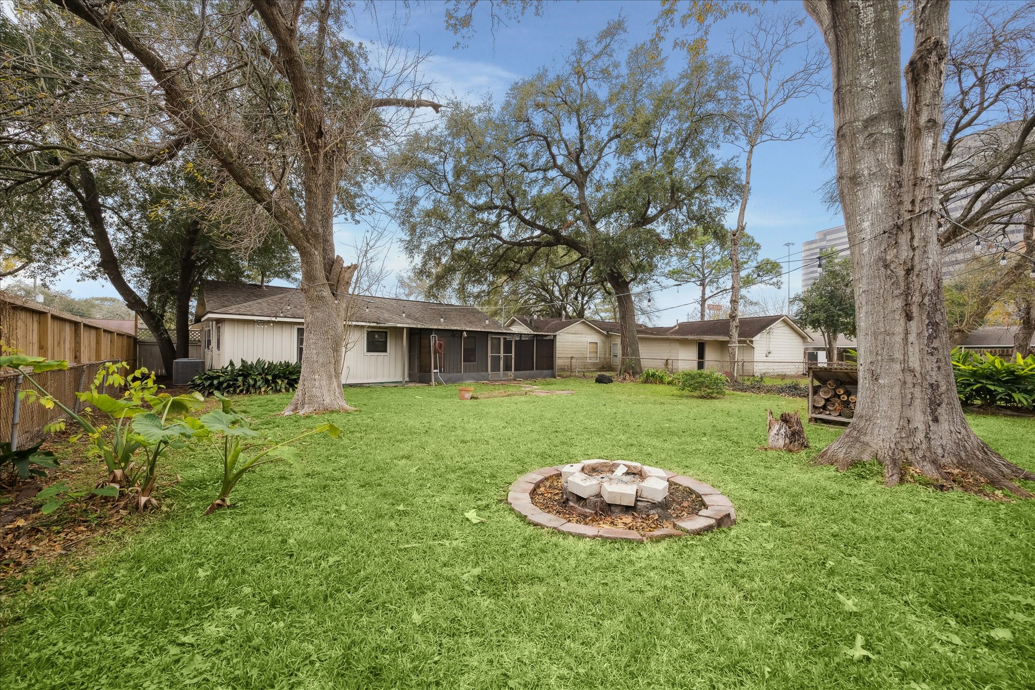 7262 Roos Road Houston, TX 77074 - Photo 24 of 25 a view of a house with a backyard