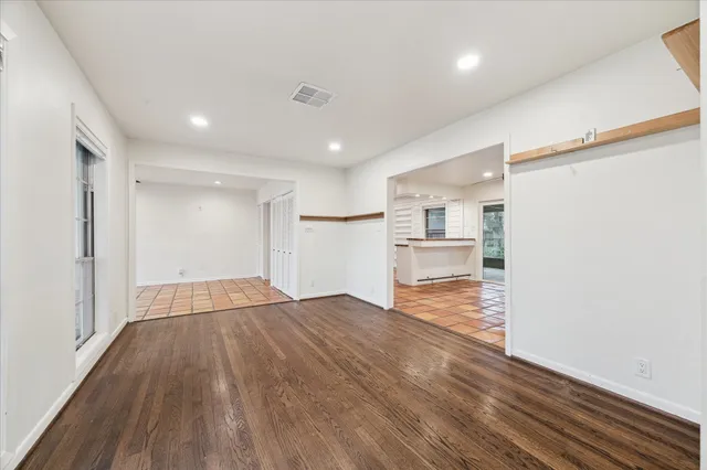 a view of kitchen and wooden floor