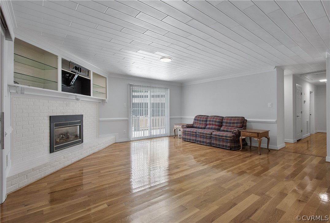 1503 Black Heath Road Midlothian, VA 23113 - Photo 11 of 50 a living room with furniture fireplace and flat screen tv