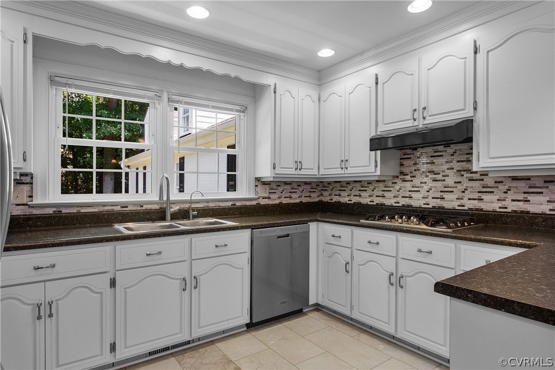 1503 Black Heath Road Midlothian, VA 23113 - Photo 16 of 50 a kitchen with granite countertop white cabinets and a sink