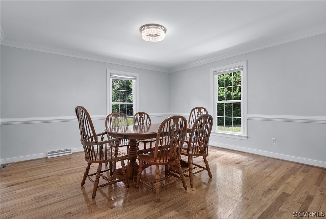 1503 Black Heath Road Midlothian, VA 23113 - Photo 19 of 50 a view of a dining room with furniture and wooden floor