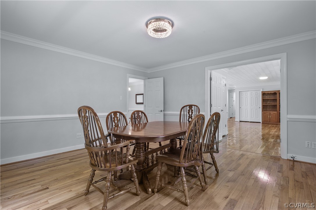 1503 Black Heath Road Midlothian, VA 23113 - Photo 20 of 50 a view of a dining room with furniture and a potted plant
