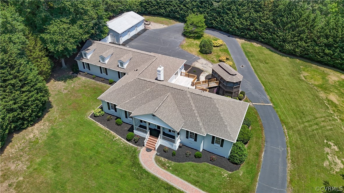 1503 Black Heath Road Midlothian, VA 23113 - Photo 2 of 50 an aerial view of a house with swimming pool and trees