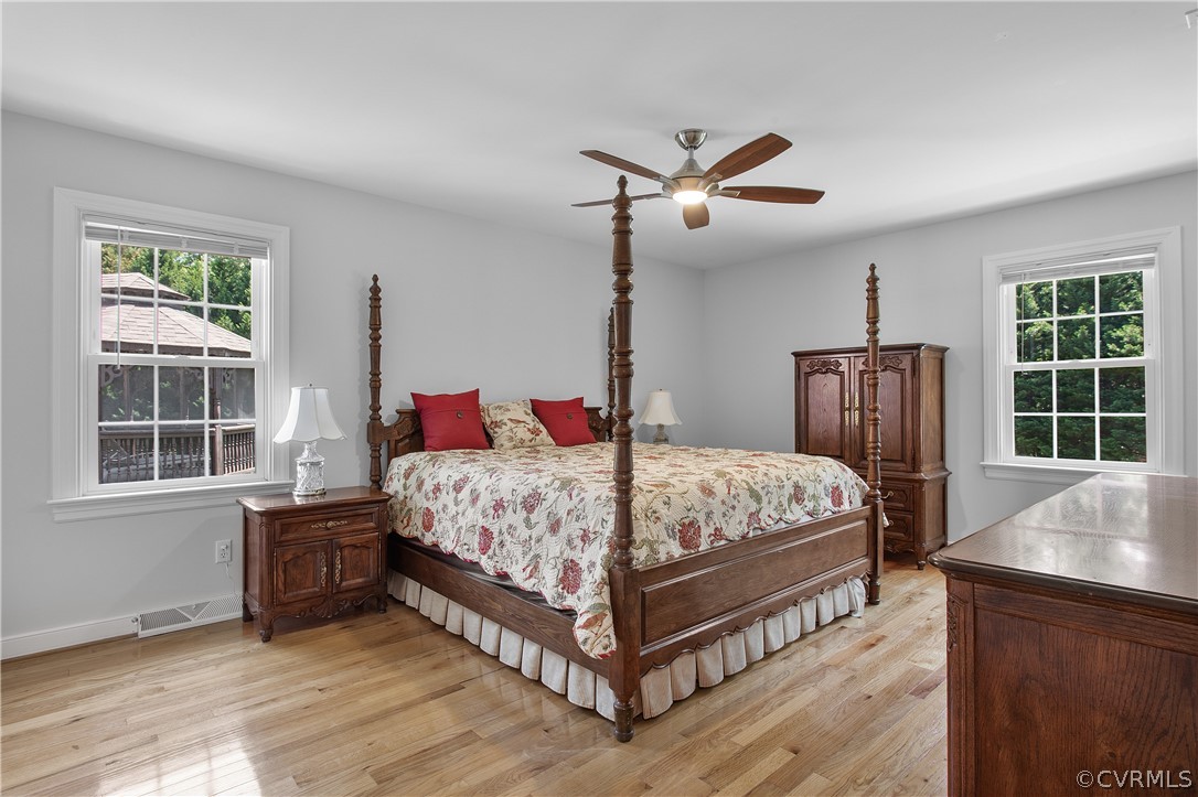 1503 Black Heath Road Midlothian, VA 23113 - Photo 27 of 50 a bedroom with a bed and a dresser next to a window