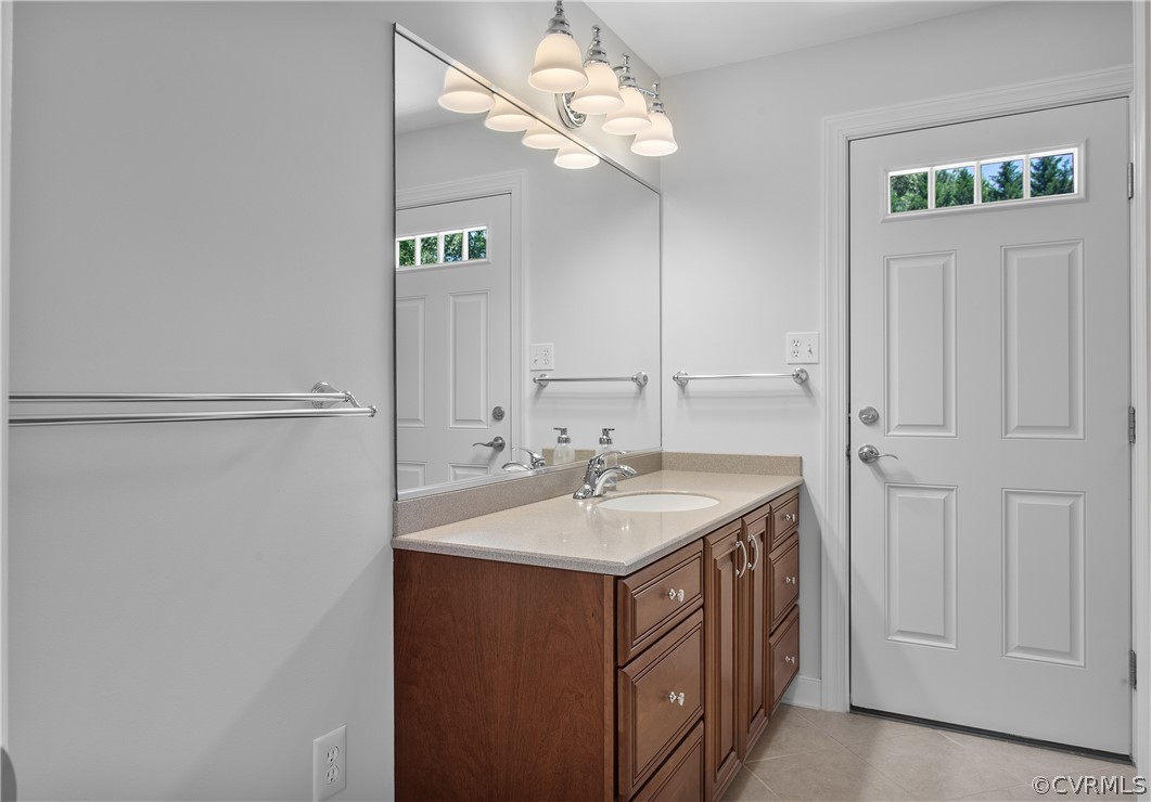 1503 Black Heath Road Midlothian, VA 23113 - Photo 31 of 50 a bathroom with a sink and a mirror