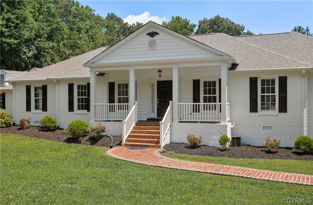 1503 Black Heath Road Midlothian, VA 23113 - Photo 4 of 50 a front view of a house with a garden