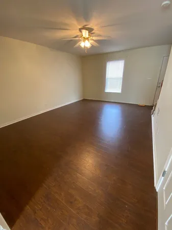 a view of wooden floor and in a room