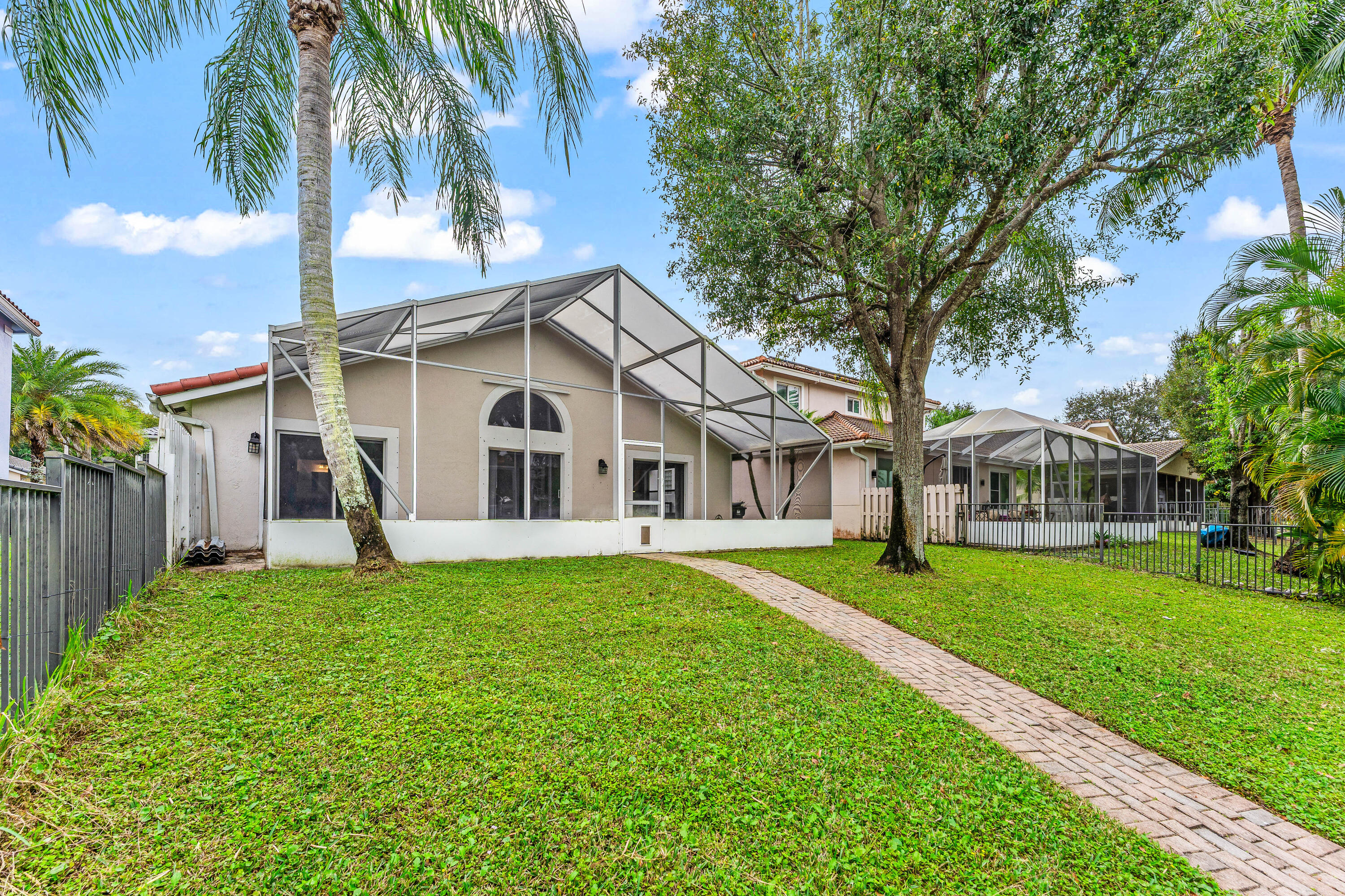 12119 Sunset Point Circle Wellington, FL 33414 - Photo 20 of 20 Fenced Patio
