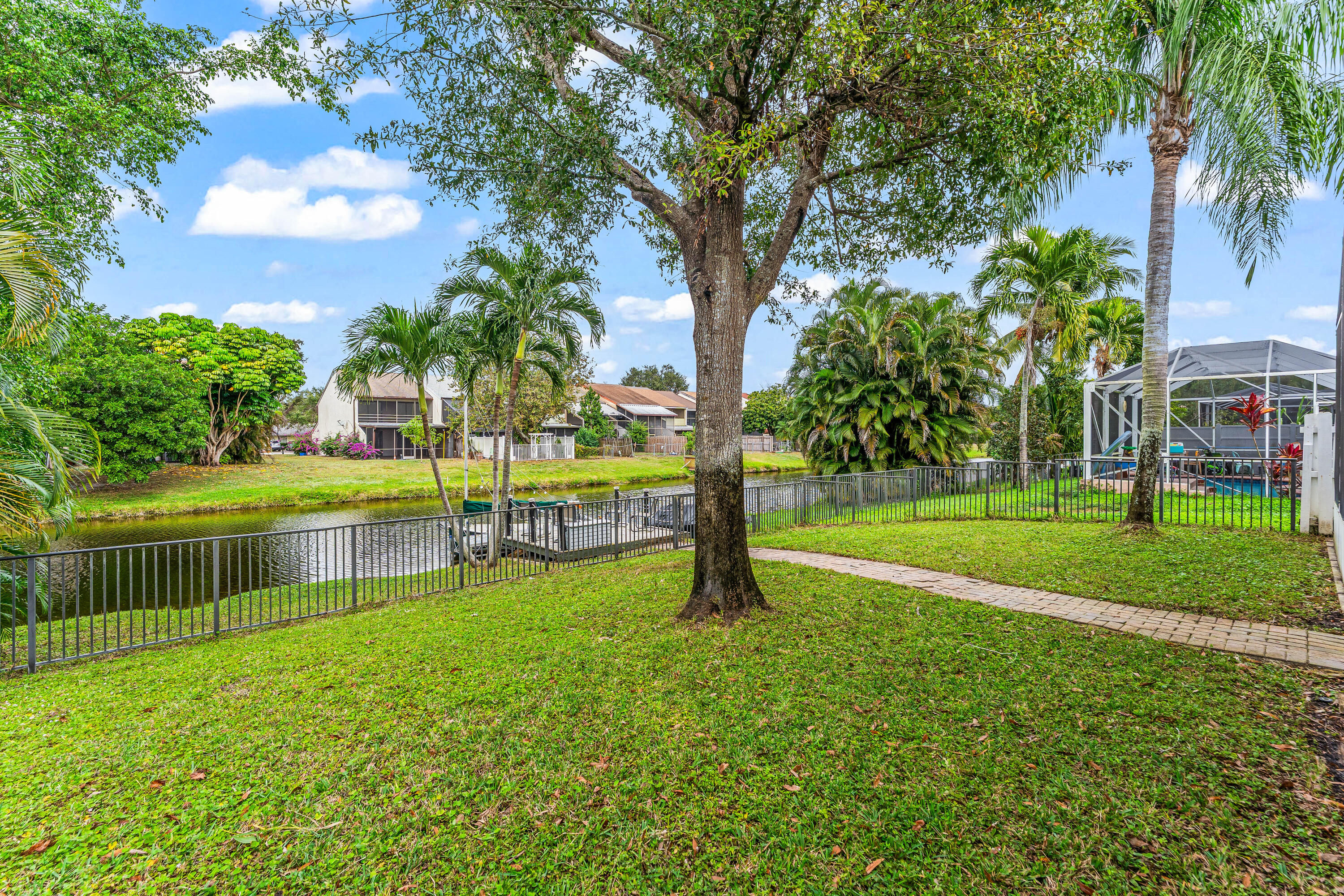 12119 Sunset Point Circle Wellington, FL 33414 - Photo 2 of 20 Fenced Patio