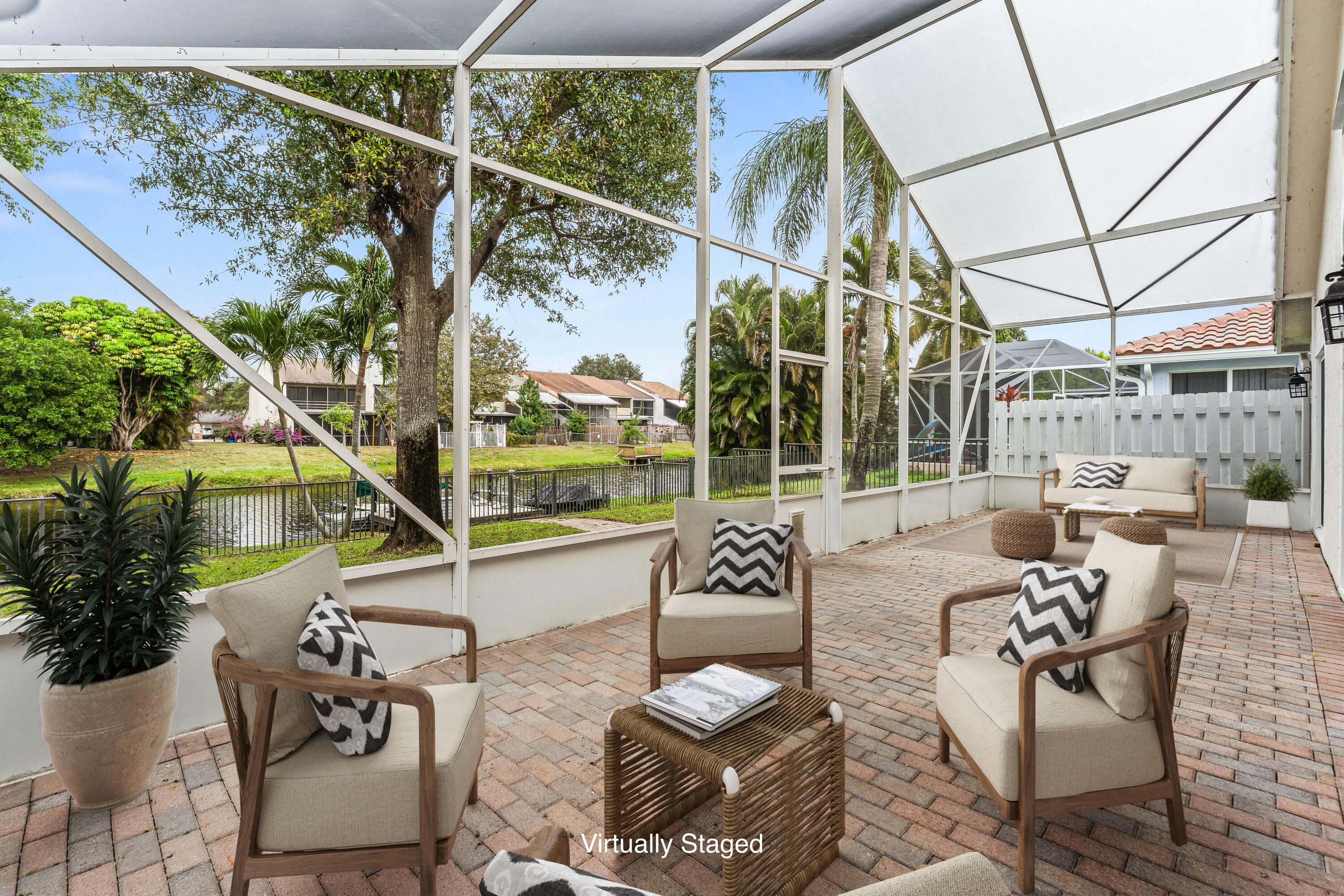 12119 Sunset Point Circle Wellington, FL 33414 - Photo 4 of 20 Virtually Staged Screened-In Patio