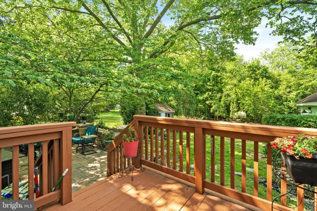 a view of deck with wooden floor and outdoor seating