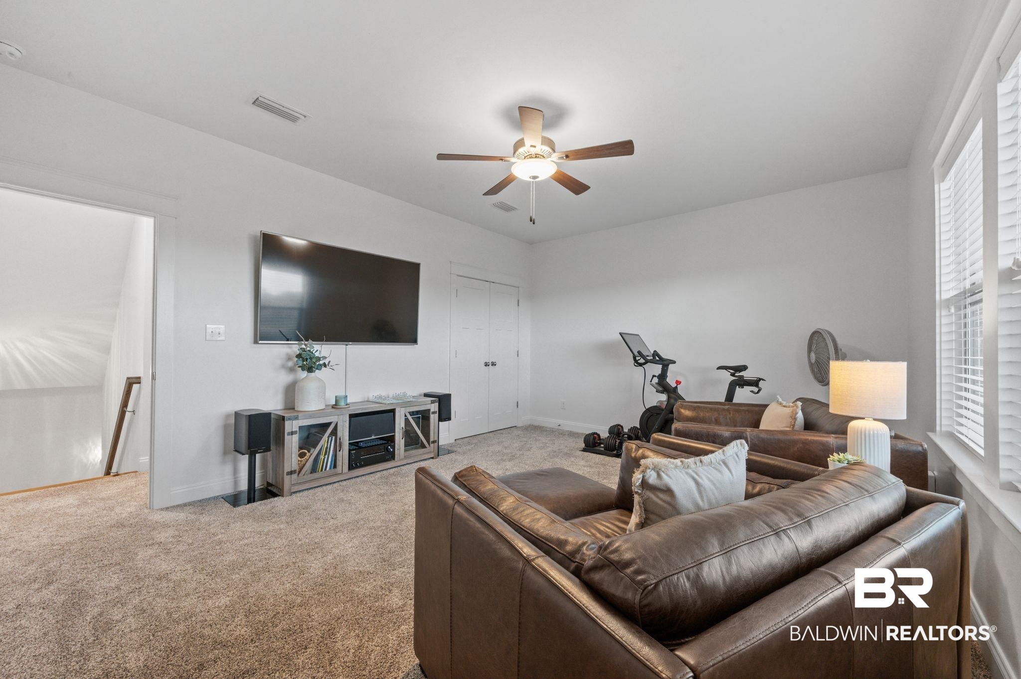 418 Fortune Drive Fairhope, AL 36532 - Photo 48 of 63 Carpeted living room with ceiling fan