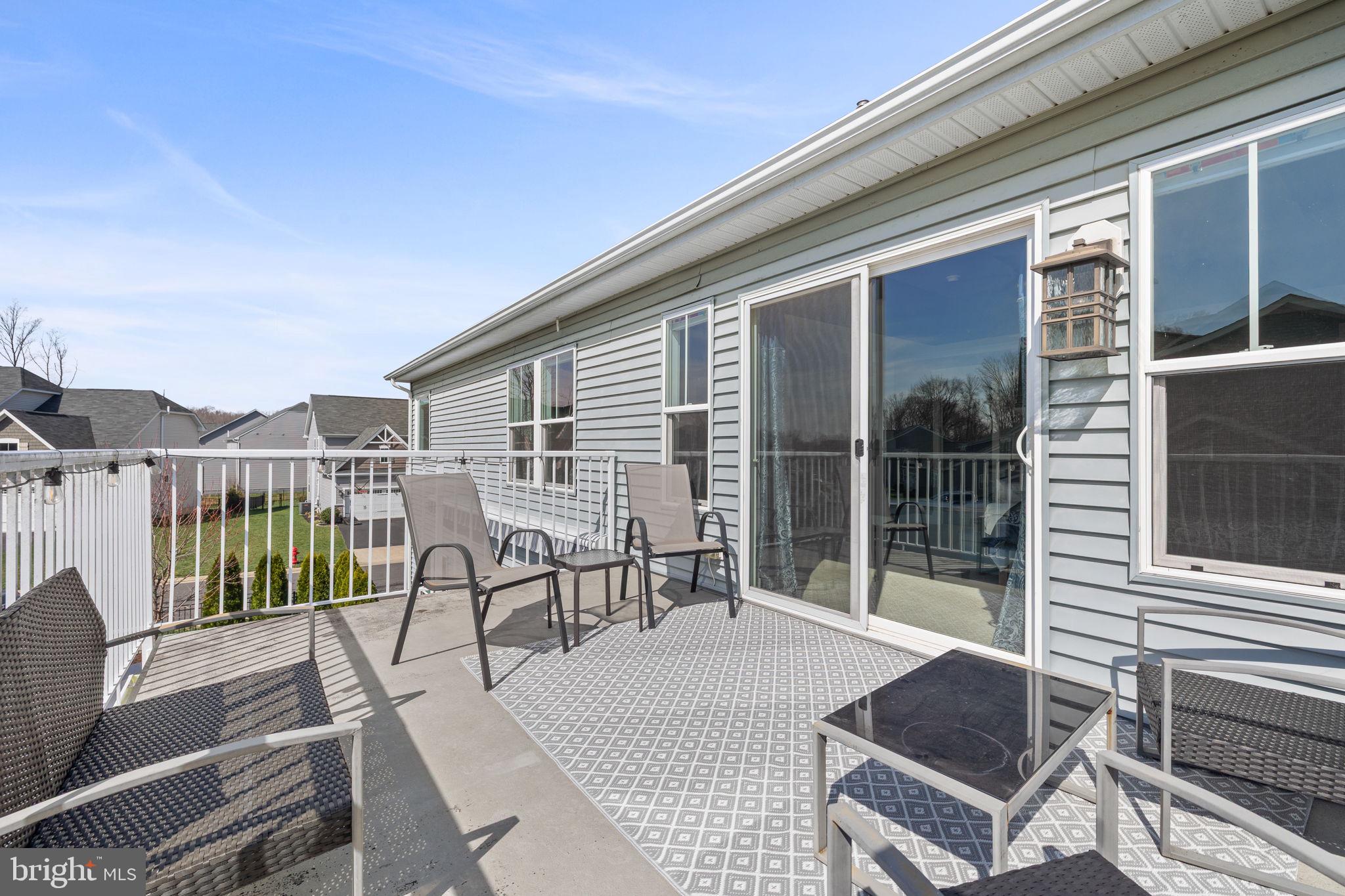 4844 Point Road Warrenton, VA 20187 - Photo 35 of 65 Deck off of owners suite looking onto the lake!