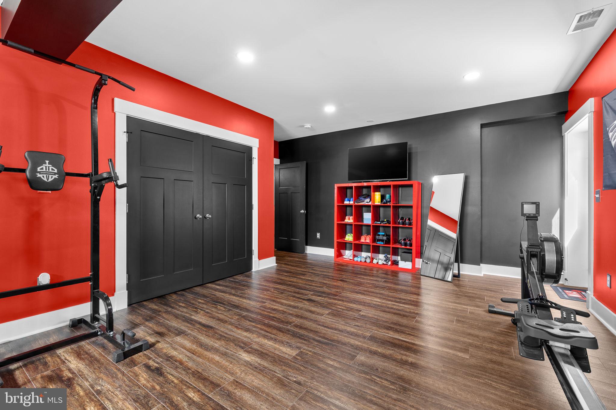 4844 Point Road Warrenton, VA 20187 - Photo 56 of 65 5th legal bedroom/ gym with door to exit & closet