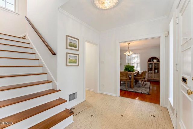 a view of entryway and workspace