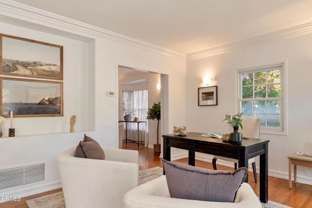 a bedroom with bed and window