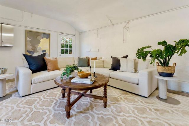 a view of a swimming pool with a garden