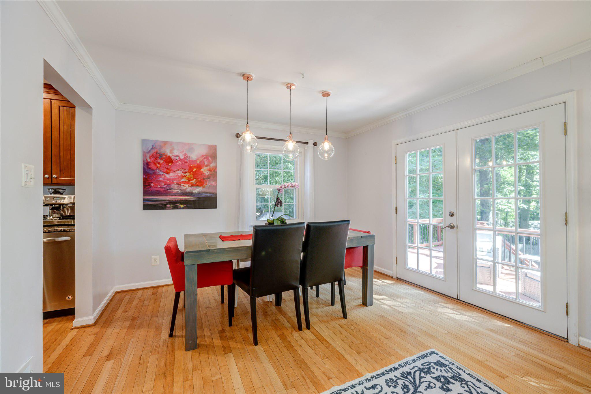 8345 Carrleigh Parkway Springfield, VA 22152 - Photo 4 of 29 Dining area leads to deck