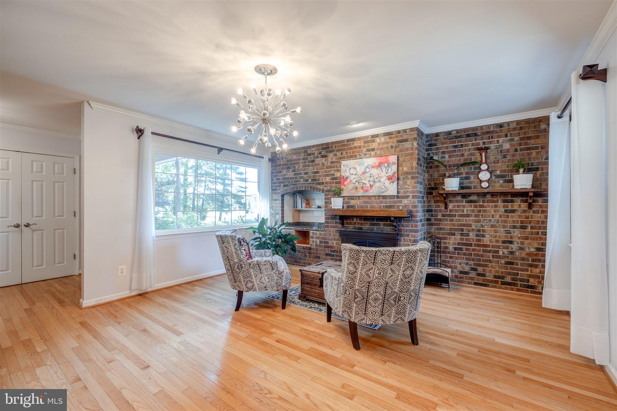 8345 Carrleigh Parkway Springfield, VA 22152 - Photo 6 of 29 Family room w/ fireplace
