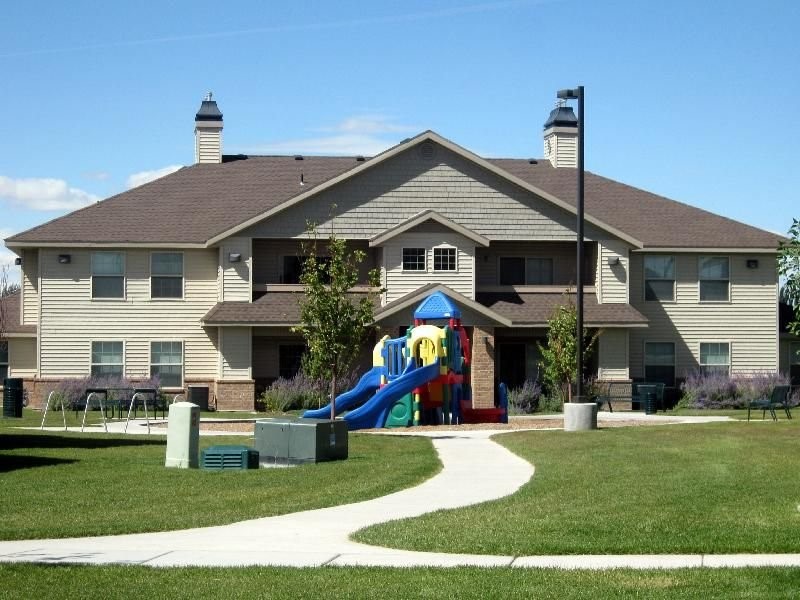256 West 3rd Street Burley, ID 83318 - Photo 3 of 11 a front view of a house with a yard