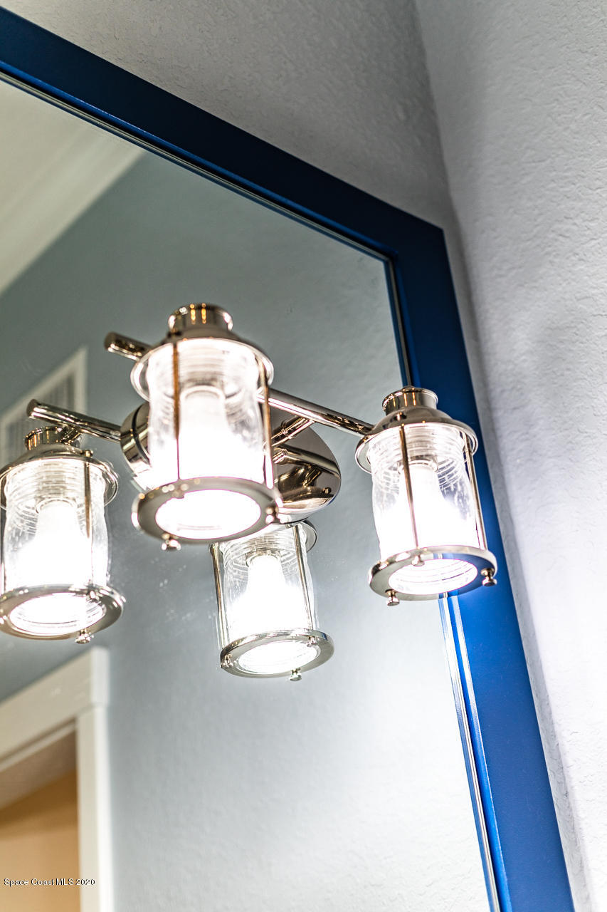 3485 Holly Springs Road Melbourne, FL 32934 - Photo 24 of 48 Master Bath Light