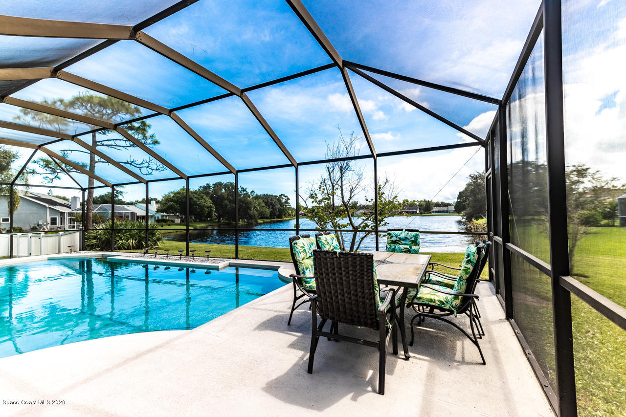 3485 Holly Springs Road Melbourne, FL 32934 - Photo 43 of 48 Pool and Patio Lake View