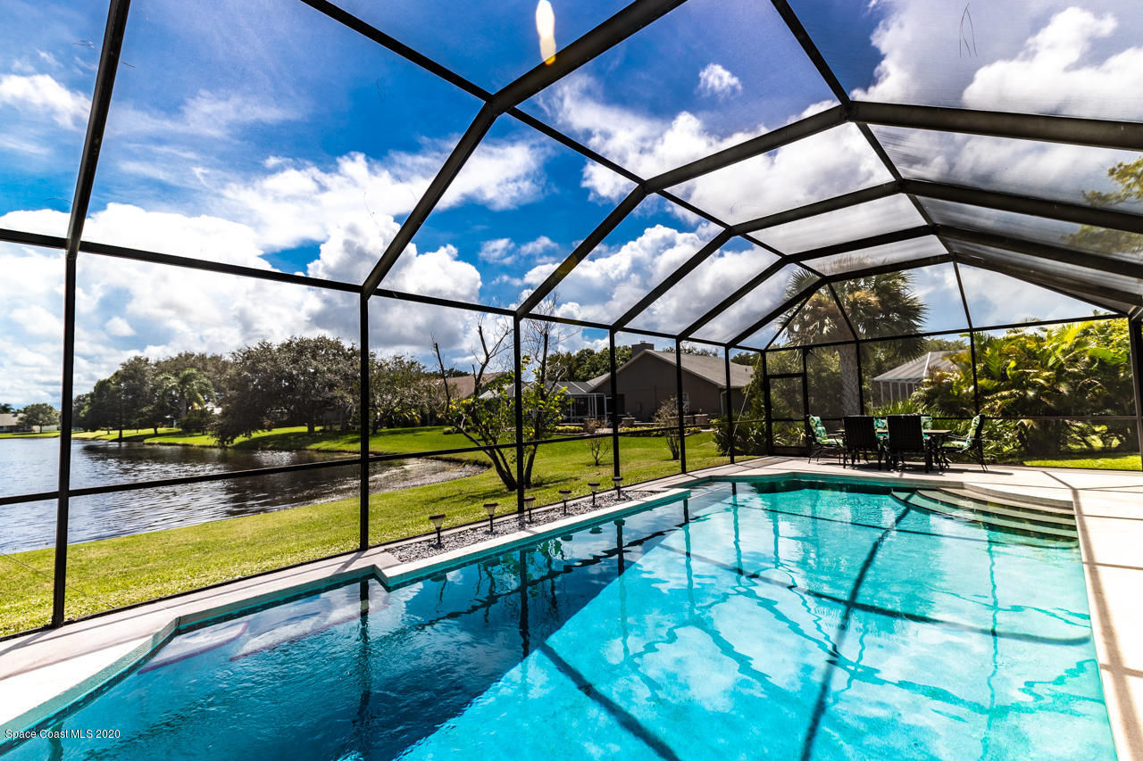 3485 Holly Springs Road Melbourne, FL 32934 - Photo 44 of 48 Pool and Patio Lake View