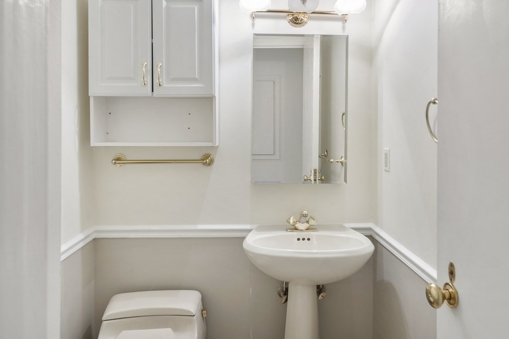 20 Rowes Wharf, Unit 503 Boston, MA 02110 - Photo 12 of 26 a bathroom with a sink and a toilet