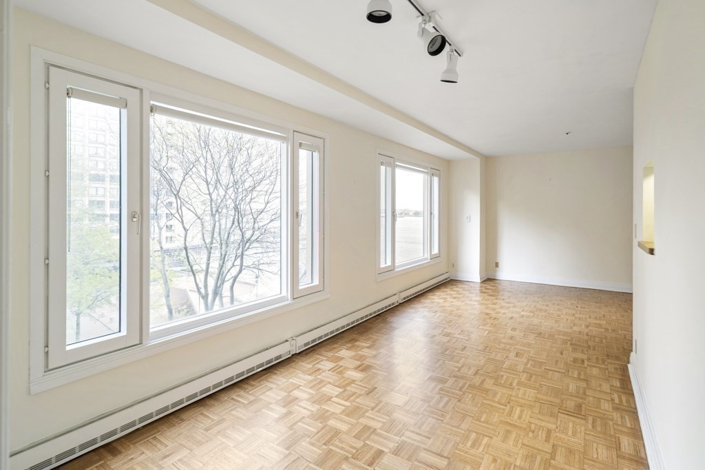 20 Rowes Wharf, Unit 503 Boston, MA 02110 - Photo 20 of 26 a view of an empty room with a window