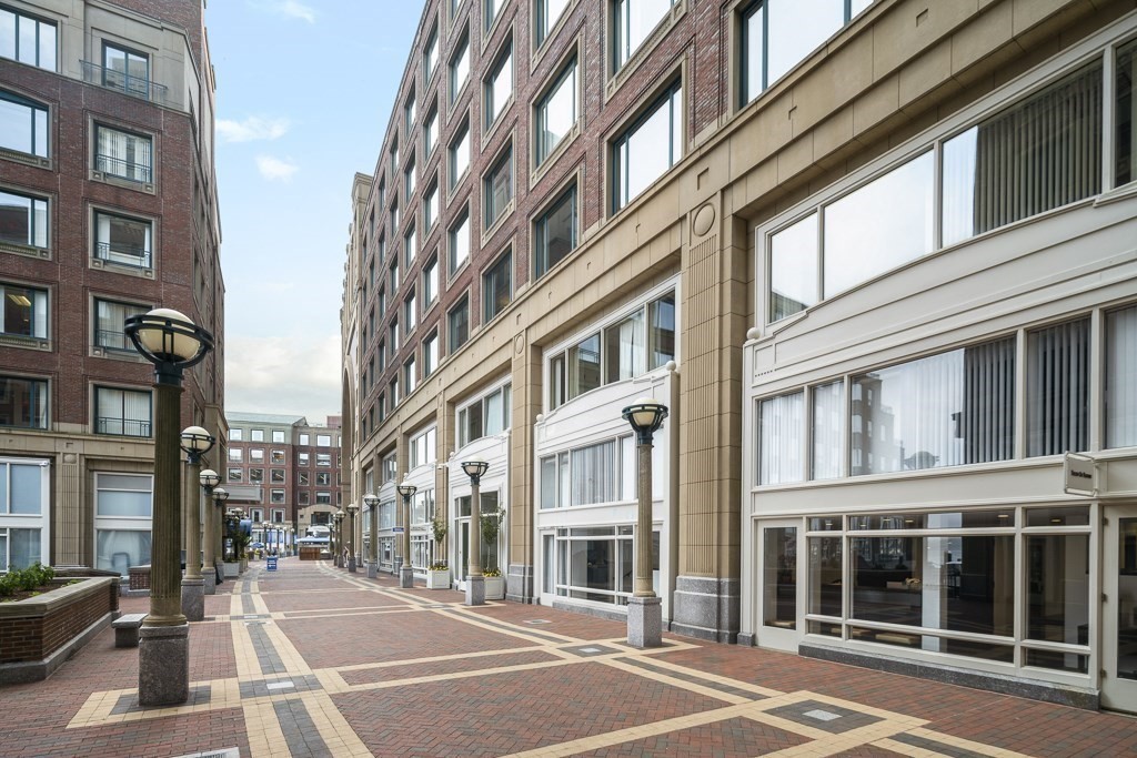 20 Rowes Wharf, Unit 503 Boston, MA 02110 - Photo 4 of 26 a view of a building with a street