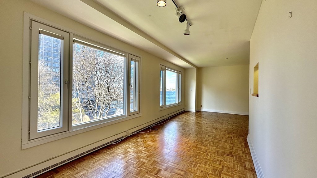 20 Rowes Wharf, Unit 503 Boston, MA 02110 - Photo 7 of 26 a view of an empty room with window