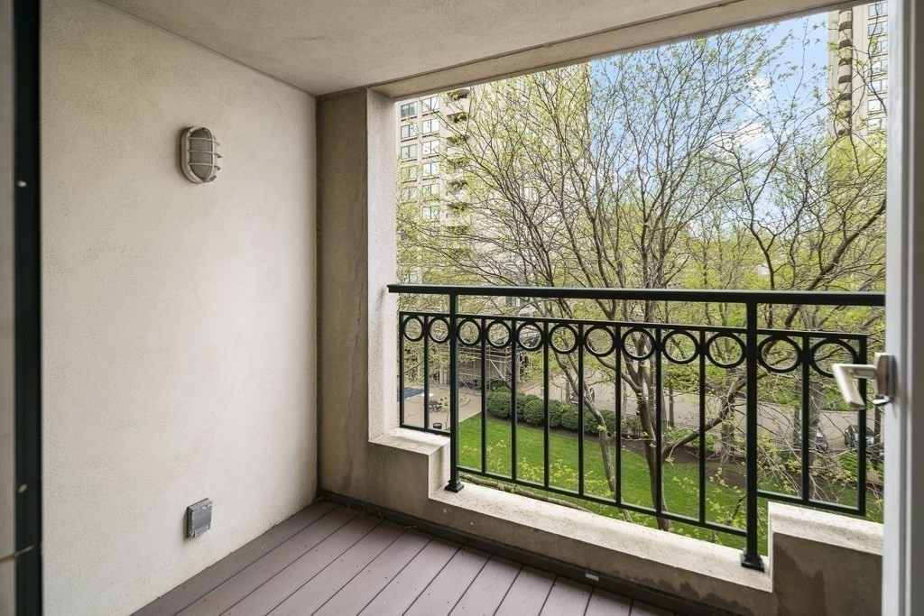 20 Rowes Wharf, Unit 503 Boston, MA 02110 - Photo 10 of 26 a view of a porch with a small yard