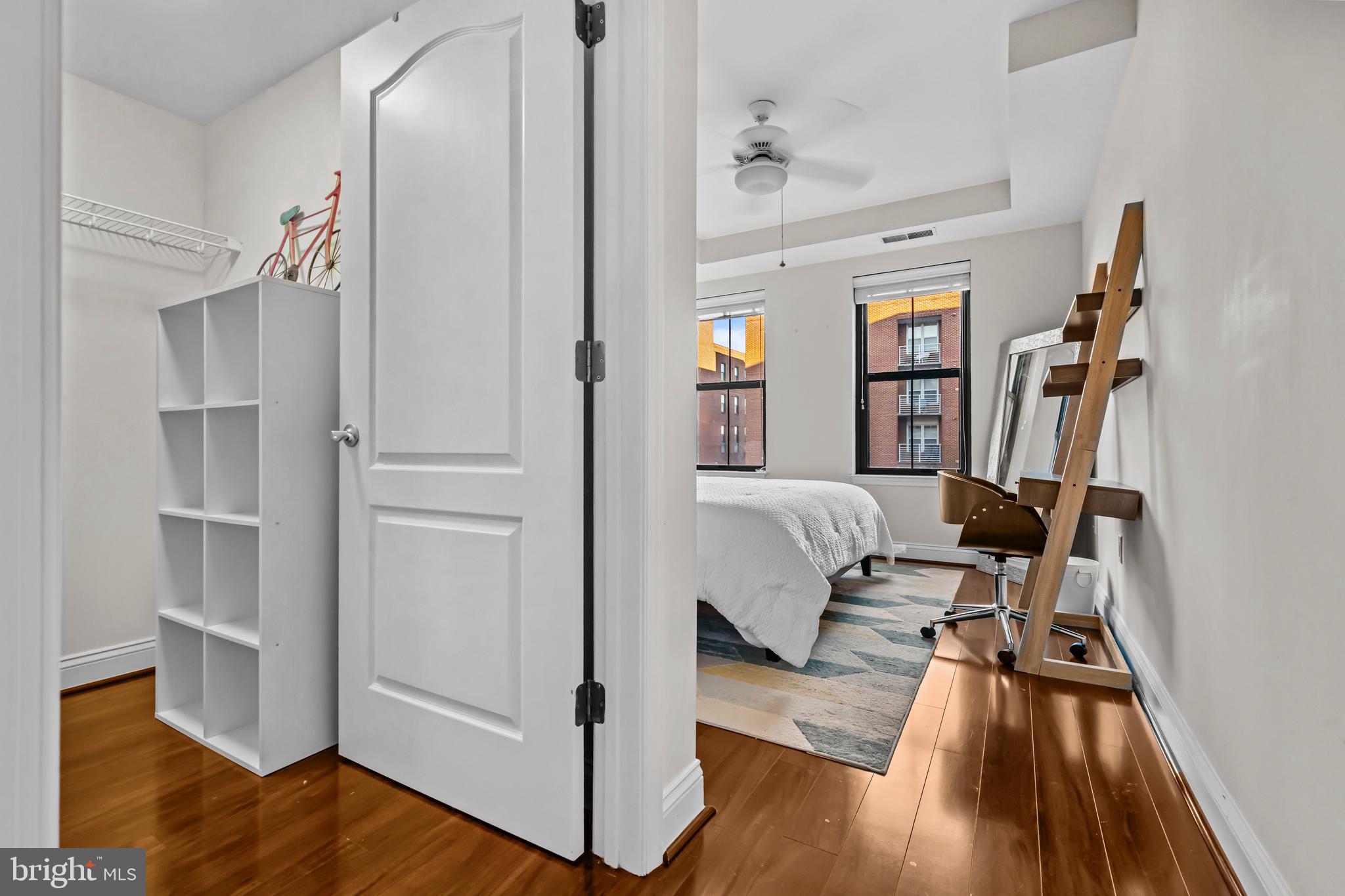 1111 Oronoco Street, Unit 326 Alexandria, VA 22314 - Photo 22 of 54 a living room with furniture and a wooden floor