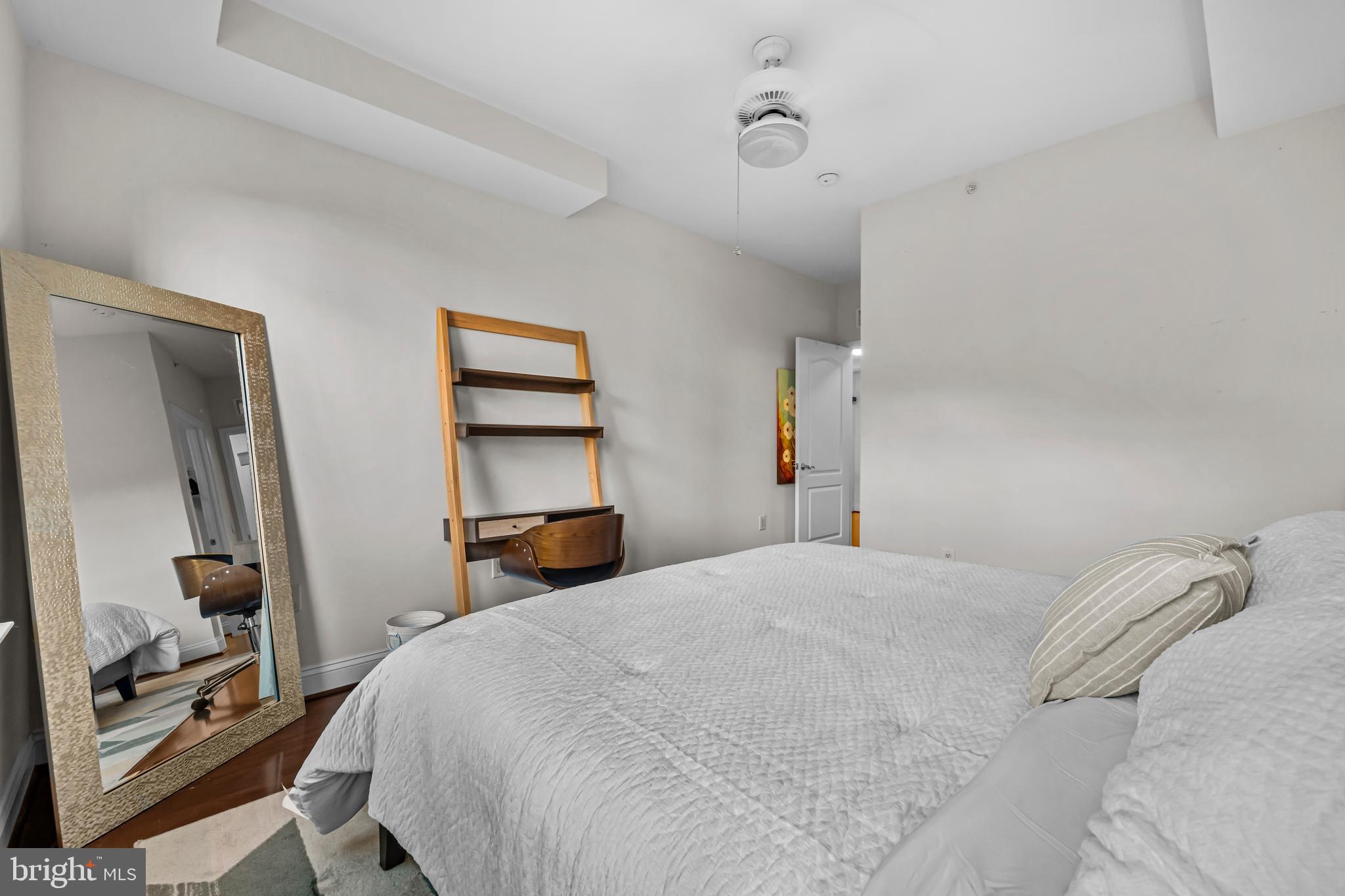 1111 Oronoco Street, Unit 326 Alexandria, VA 22314 - Photo 26 of 54 a bedroom with a bed and a window