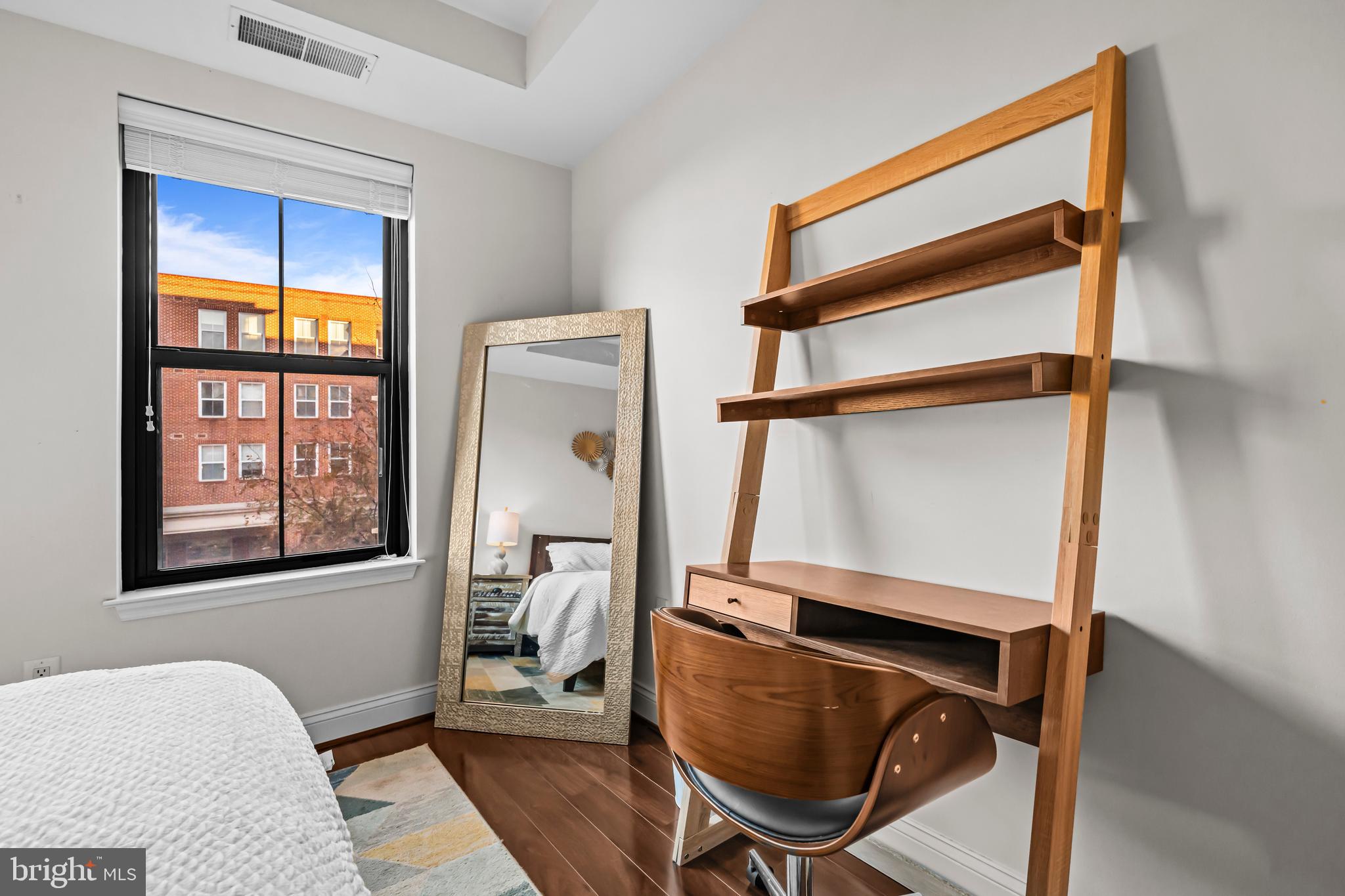 1111 Oronoco Street, Unit 326 Alexandria, VA 22314 - Photo 29 of 54 a view of room with window and wooden floor