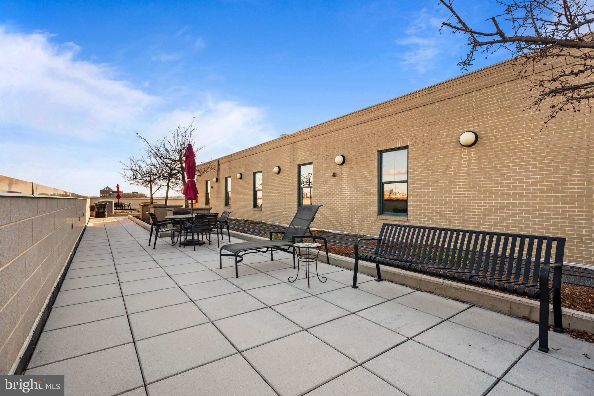 1111 Oronoco Street, Unit 326 Alexandria, VA 22314 - Photo 45 of 54 a view of a terrace with furniture