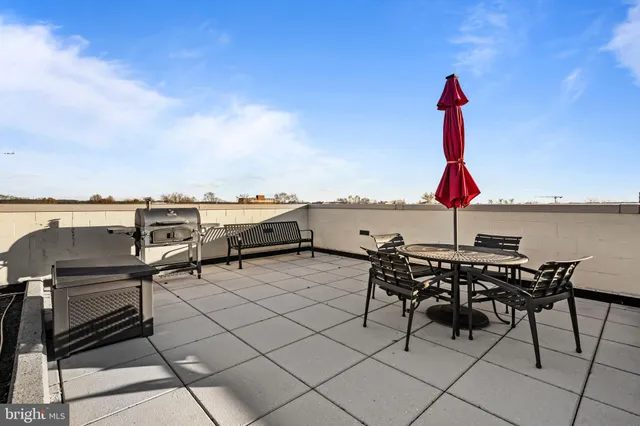 a view of a large building with a yard