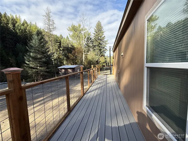a view of a backyard of the house